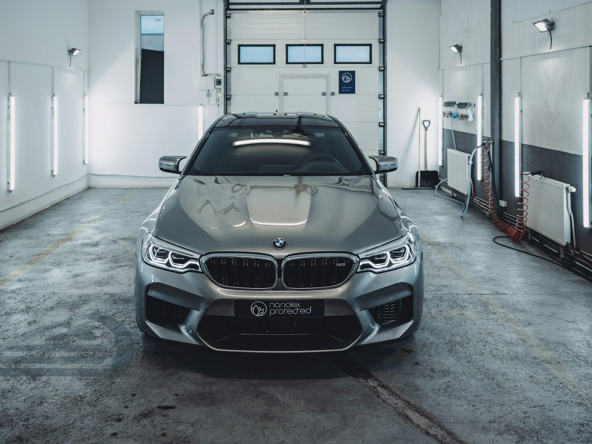 grey BMW car inside building